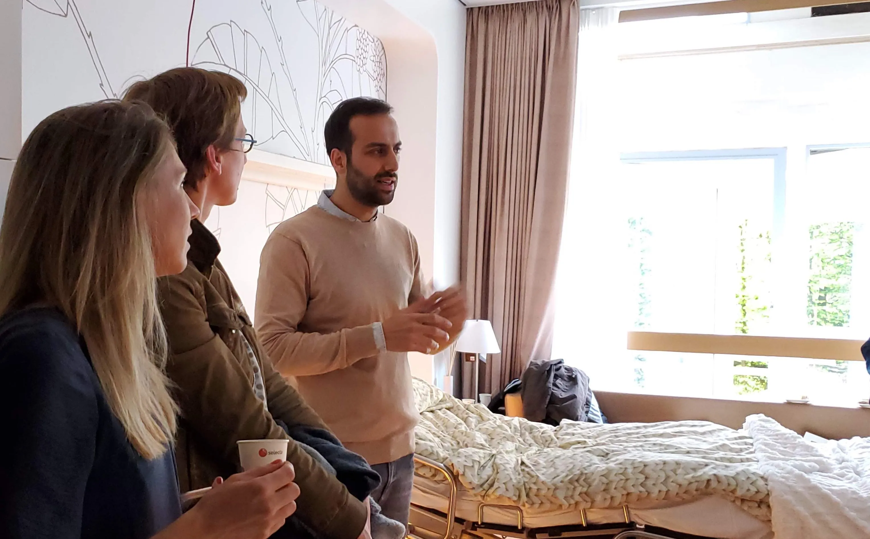 Ouva team collaborating with nurses, physicians, and patients during the stepwise design process
